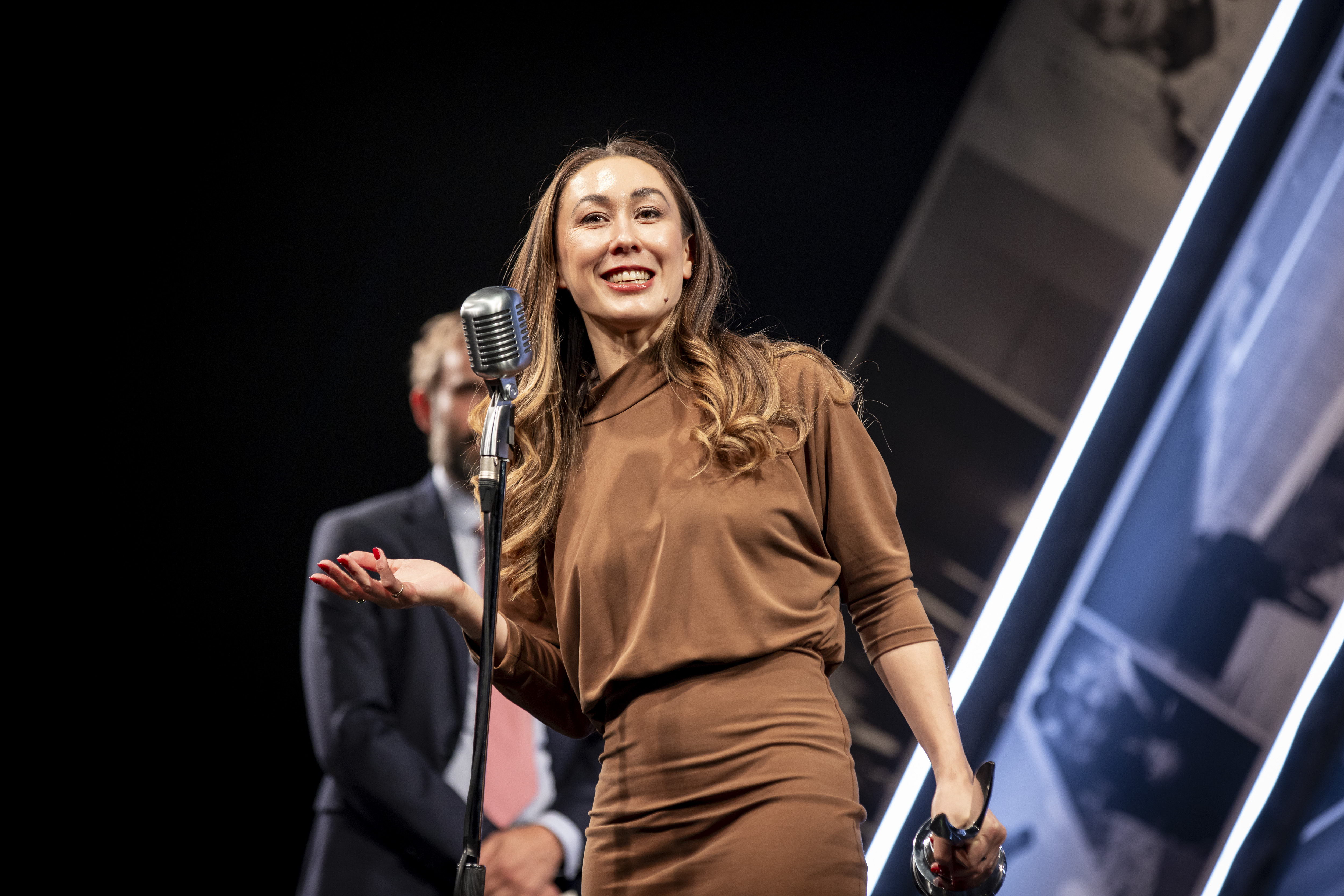 Aisling accepting award